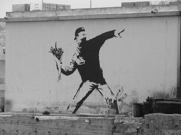 banksy-love-is-in-the-air-graffiti